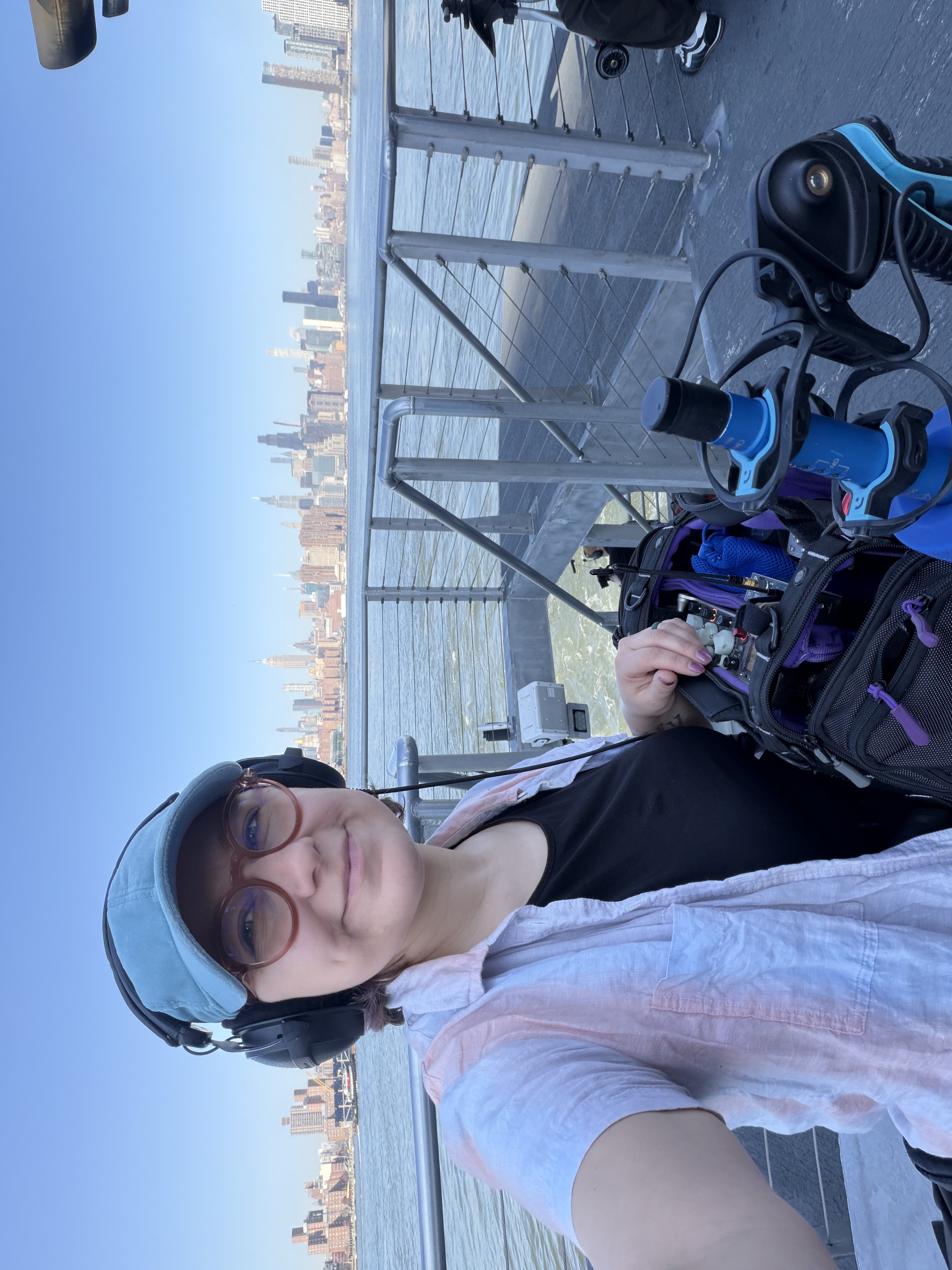 Rachel Suffian on set — NYC skyline